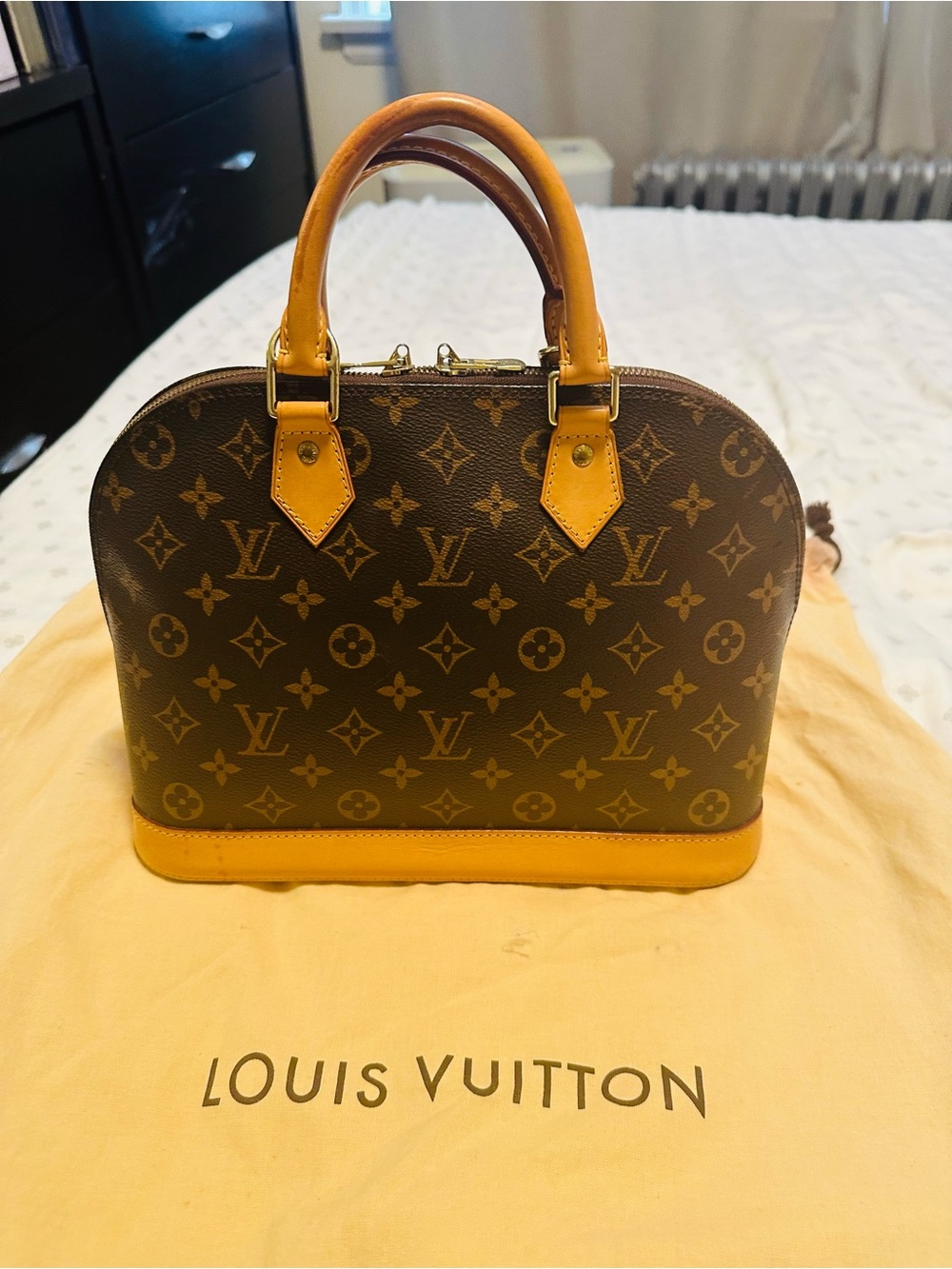 Louis Vuitton Monogram Alma Satchel in Brown and Tan Leather Trim